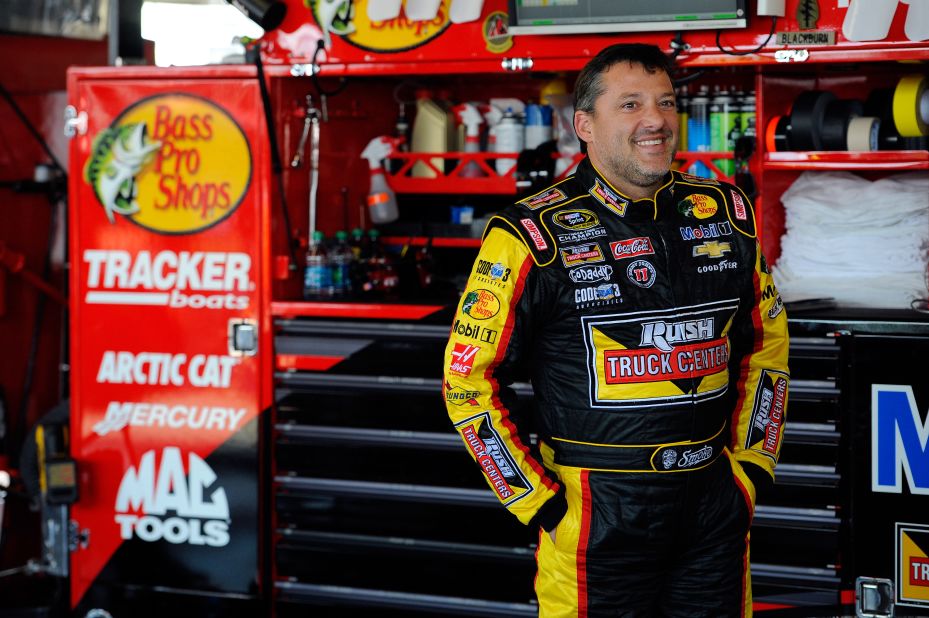 NASCAR driver Tony Stewart looks on in the garage area during practice for a race in Watkins Glen, New York, on Friday, August 8. Stewart is a three-time champion in NASCAR's top division.