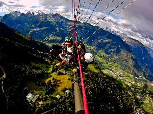 Extendable camera pole? Check. Smiling as though you're not scared out of your mind? Maybe check.