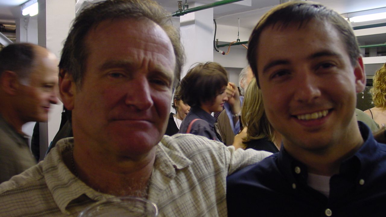 Williams and David Buist, who was suffering from a rare form of lymphomia, pose together backstage at 2004 performance.