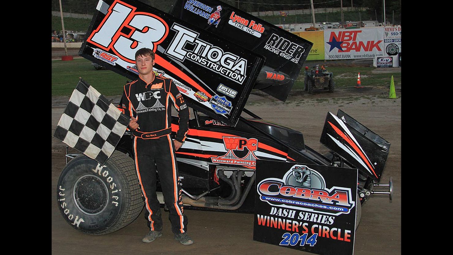 Kevin Ward Jr. in the victory lane with his car in July 2014.