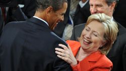 US President Barack Obama shares a laugh with Secretary of State Hillary Clinton as he arrives to address a joint session of Congress on his embattled healthcare reform plan at the US Capitol in Washington, DC, on September 9, 2009. Obama, whose approval ratings have taken a hit, hopes to regain control of healthcare reform, one of his top legislative priorities. AFP PHOTO/Jewel SAMAD (Photo credit should read JEWEL SAMAD/AFP/Getty Images)