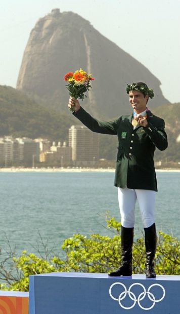 Pessoa won the Athens 2004 Olympic showjumping title, but only once Irish rider Cian O'Connor had been disqualified -- months after the event -- following the revelation that his horse had tested positive for a prohibited substance. Here Pessoa receives the gold medal, at last, a year later in front of Rio's Sugarloaf Mountain.