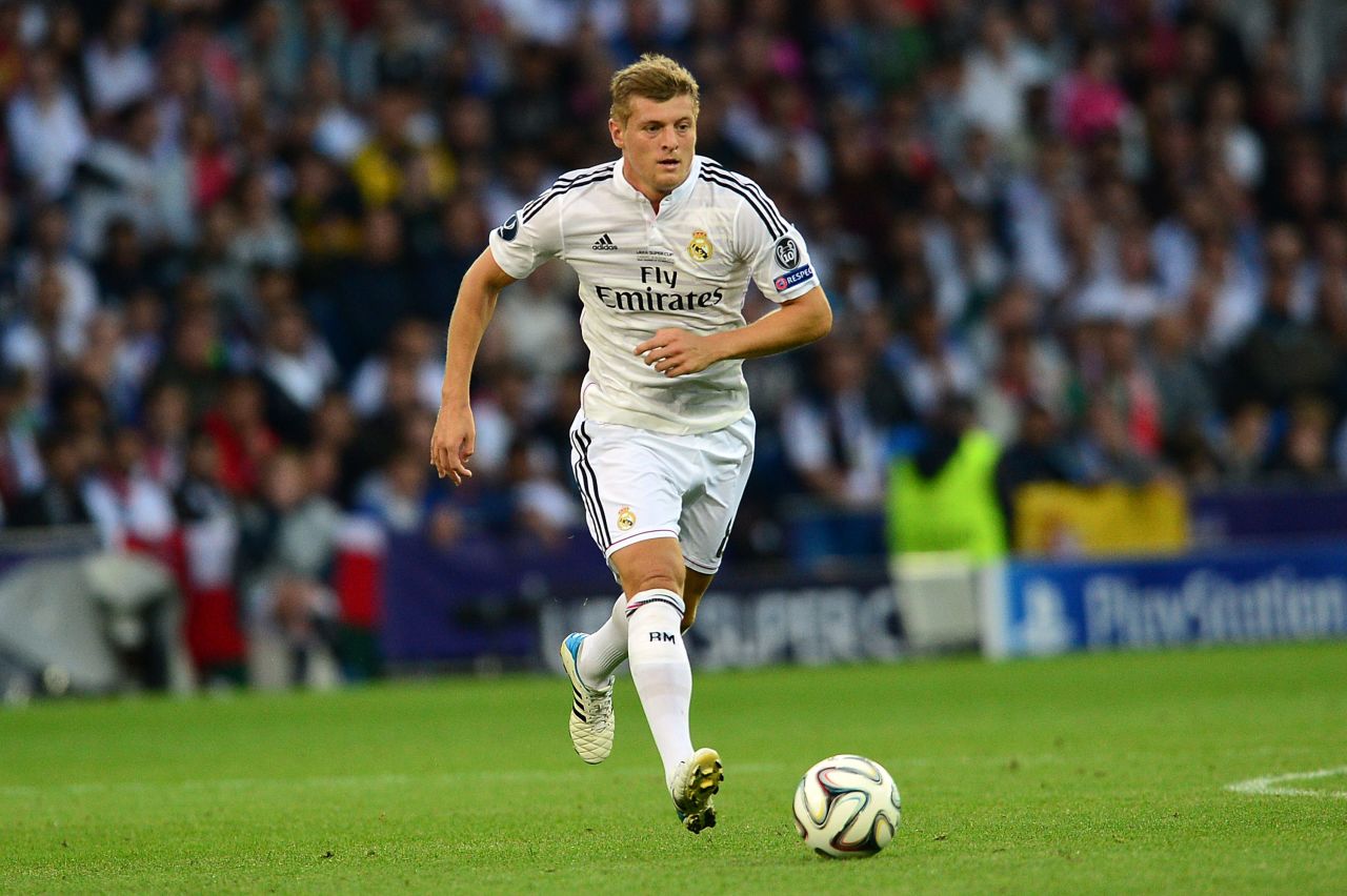 It was the first glimpse of Germany's World Cup-winning midfielder Toni Kroos in the famous white of European Champions League holders Real. The 24-year-old signed from German champions Bayern Munich after his success in Brazil.
