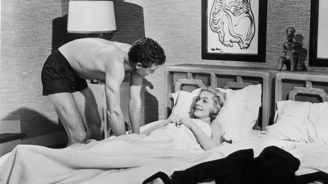 Robert Stack and Bacall in a scene from 1958's "The Gift Of Love." 