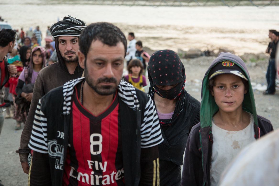 Yazidis fled into the barren and windswept Sinjar Mountains more than a week ago after ISIS captured their town. 