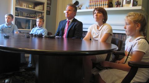 The family of Jeffrey Edward Fowle sit with their attorney, Tim Tepe, during a news conference regarding the American, who is currently detained in North Korea.