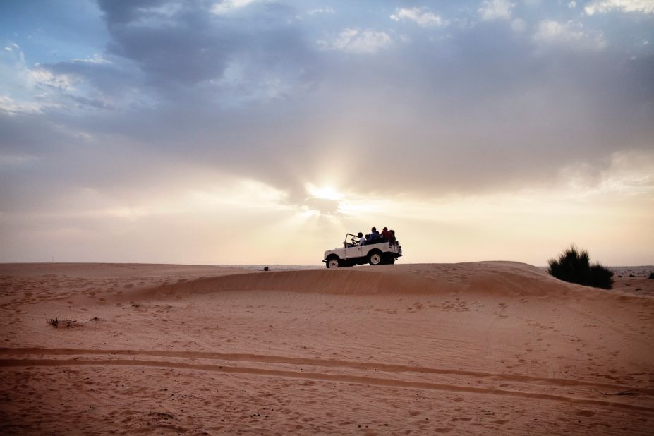 In the Dubai desert, camel rides, temporary henna tattoos and belly dancing are a desert drive away from a stunning and remote campsite with low-slung tables and pillows for seats.