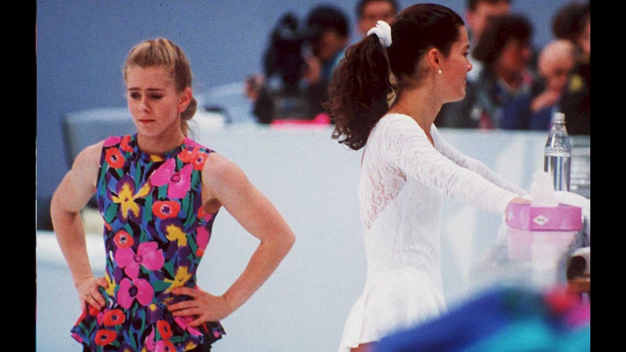 Tonya Harding, the first female figure skater to complete a triple axel in competition, received a lifetime ban from U.S. Figure Skating after her ex-husband attacked rival skater Nancy Kerrigan before the 1994 Winter Olympics. The U.S. federation concluded that Harding, seen here at left next to Kerrigan, knew about the attack beforehand and engaged in "unethical behavior." 