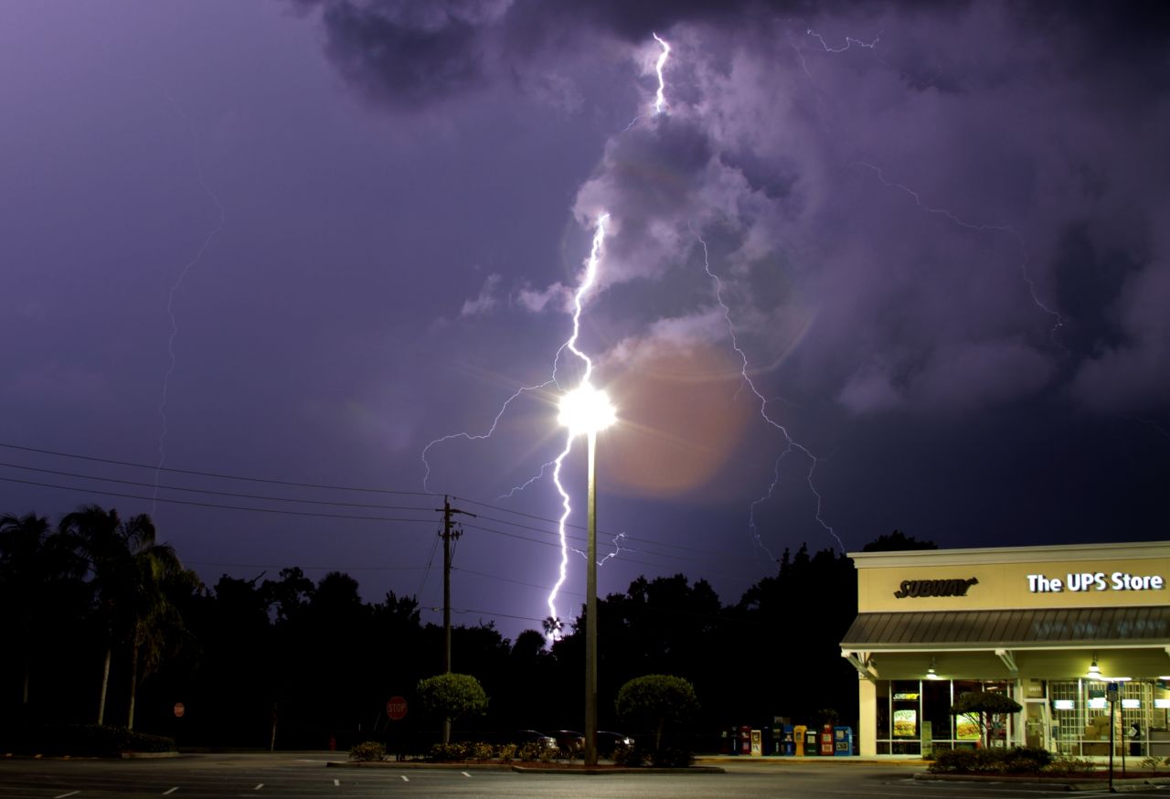 It's only an optical illusion, but lightning appears to be striking a lamppost in this June photo from <a href="http://ireport.cnn.com/docs/DOC-1141887">Billy Ocker</a>. "The storm was wicked strong," he remembered.