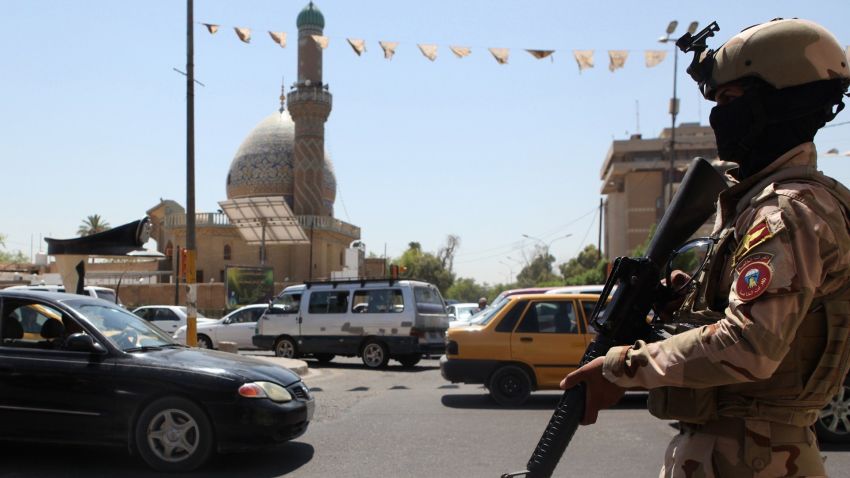 A member of the Iraqi security forces stands guard in central Baghdad on August 13, 2014. Iraq's caretaker premier Nuri al-Maliki said today it will take a court ruling for him to leave power, defying the president's decision to task a rival with forming a government. AFP PHOTO/AMER AL-SAEDIAMER AL-SAEDI/AFP/Getty Images