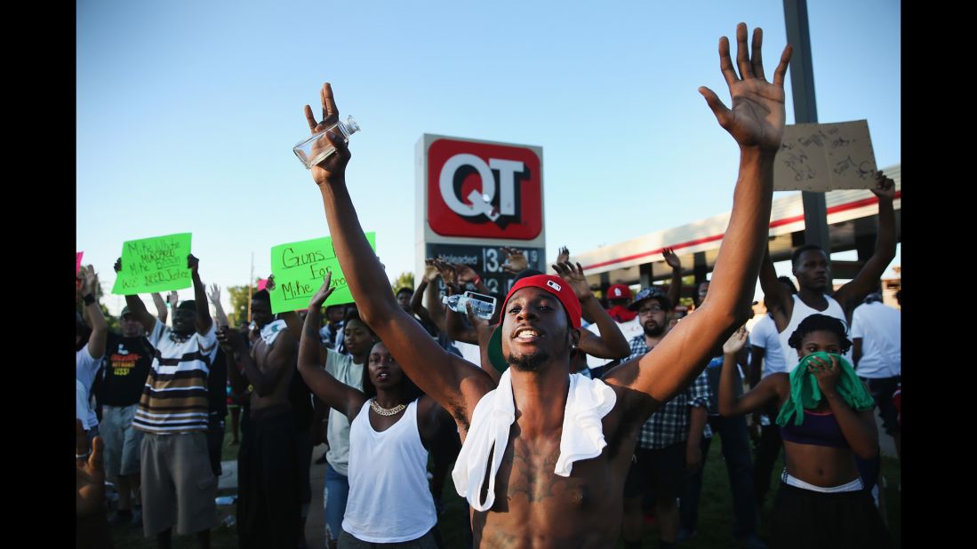 Demonstrators protest August 12 in Ferguson, 2014.