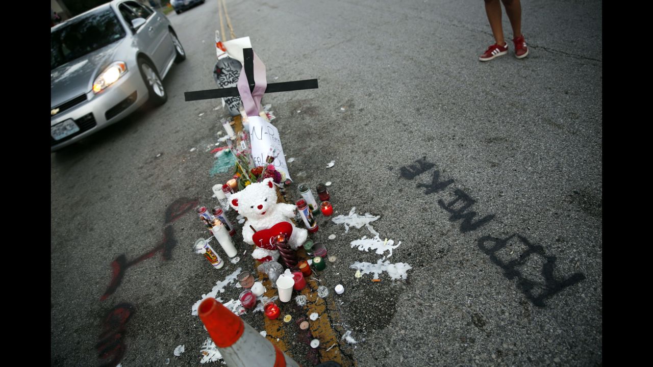 A makeshift memorial sits in the middle of the street where Michael Brown was shot and killed.
