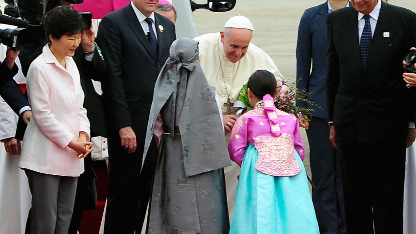 Pope Francis arrives at Seoul military airport on August 14, 2014 in Seoul, South Korea. Pope Francis is visiting South Korea from August 14 to August 18. This trip is the third trip abroad for the pope following Brazil and the Middle East. This is the third pontifical visit to South Korea. (Photo by Song Kyung-Seok-Pool/Getty Images)