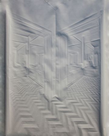 Much of Simon Schubert's work has an architectural theme. The absence of color creates a ghostly, ethereal effect that ironically attracts attention in galleries because of its lack of color.