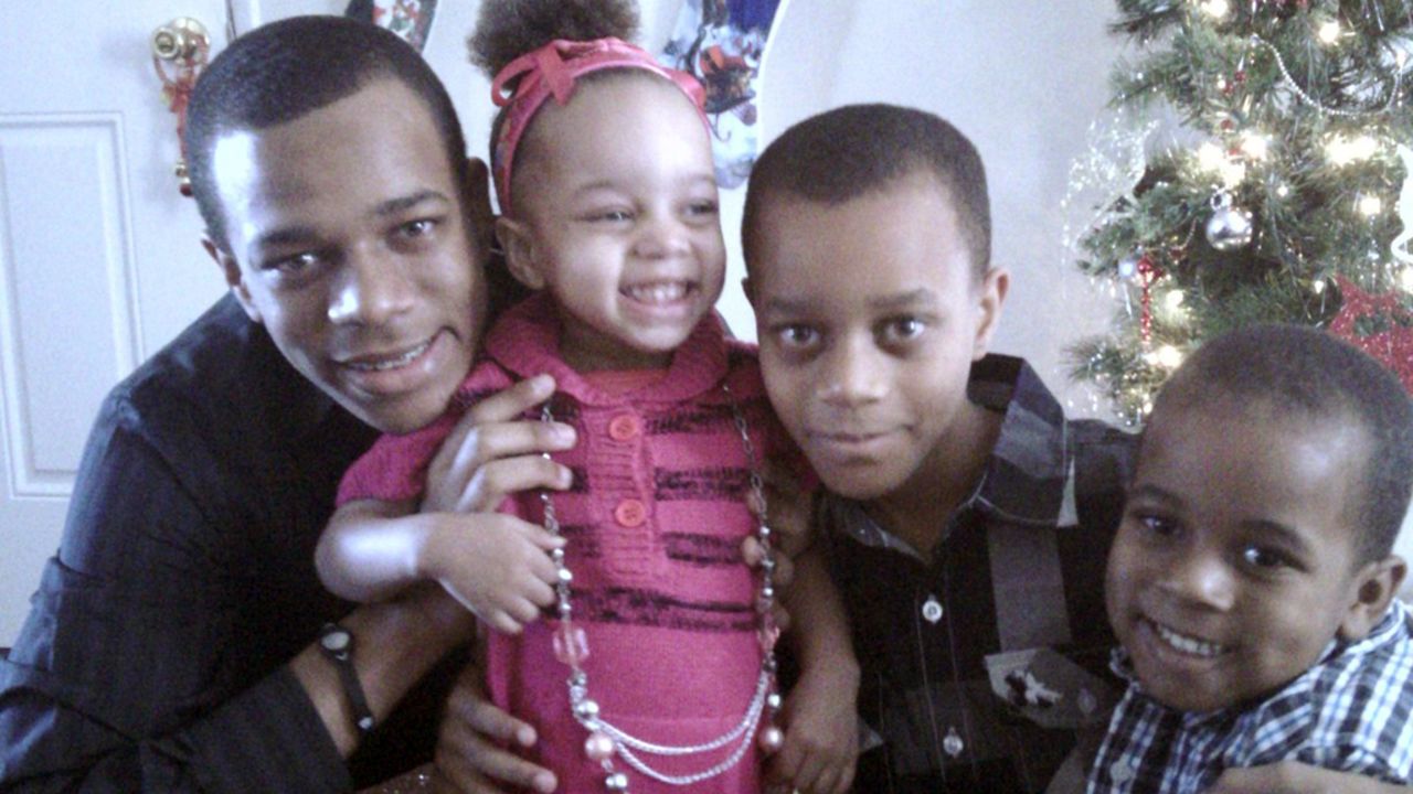 Crishawn Spicer, a 15-year-old high school sophomore (left), with siblings Kaila, 3, Cameron, 12, and Kyle, 5.