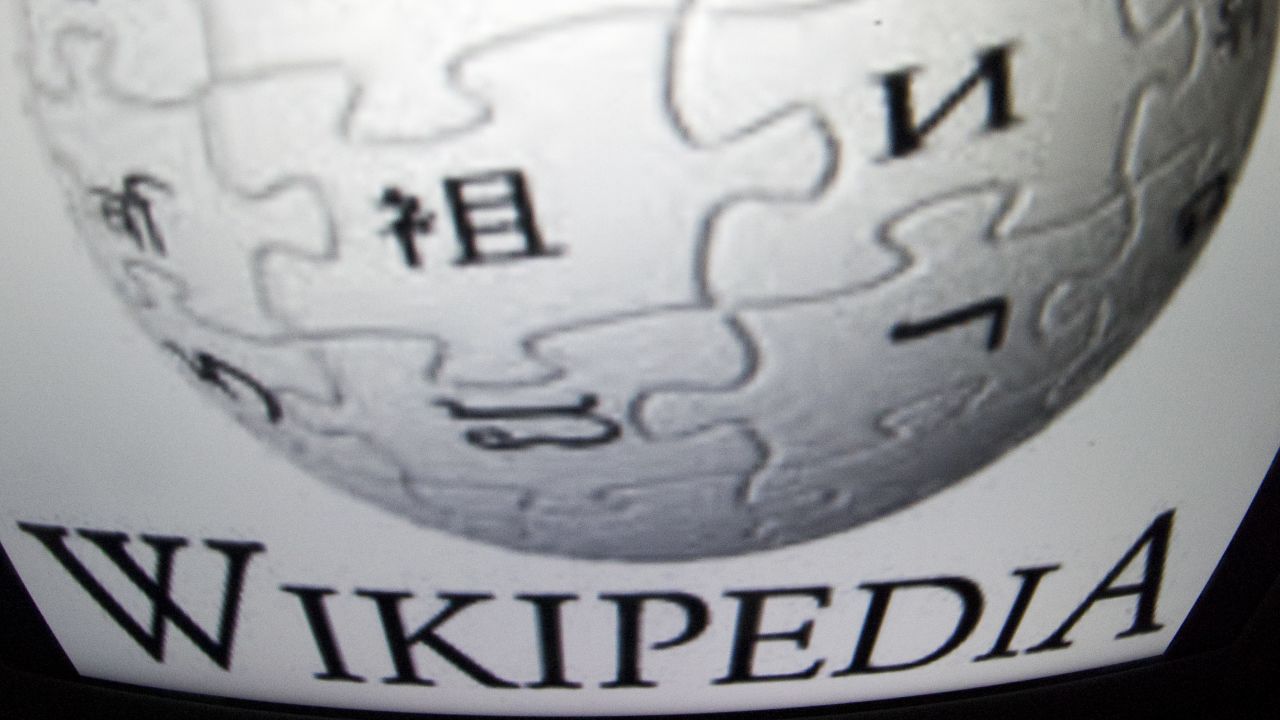 The 'Wikipedia' logo is seen on a tablet screen on December 4, 2012 in Paris.