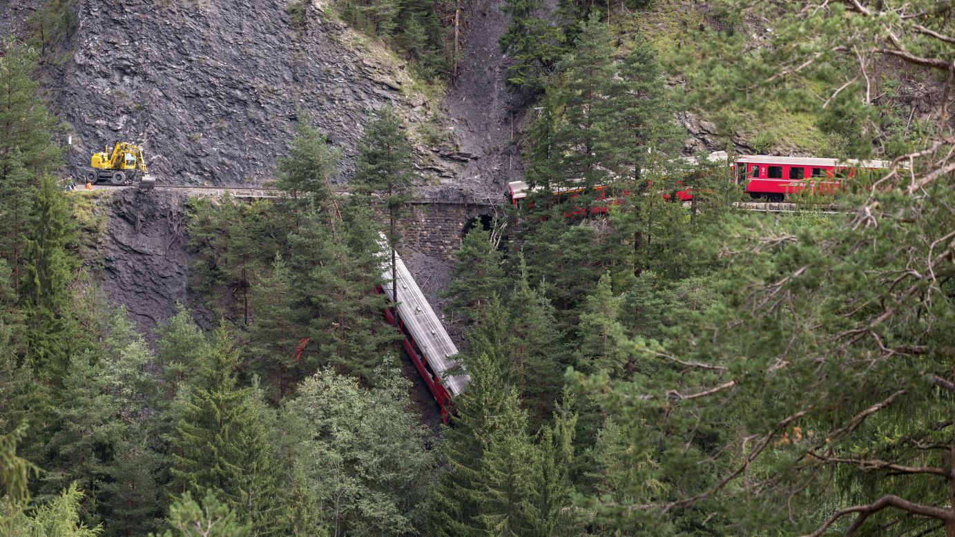 A derailed passenger train is seen near Tiefencastel, Switzerland, on Wednesday, August 13. A landslide caused the train to <a href="http://www.cnn.com/2014/08/13/world/gallery/switzerland-train-derailment/index.html">partially derail</a> in the Swiss Alps, injuring at least six people, regional police spokesman Peter Faerber said.