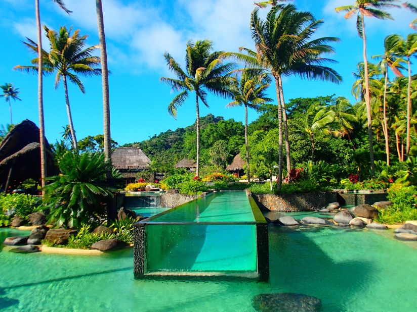 Laucala Island's main pool comes with its own human-sized "fish tank."