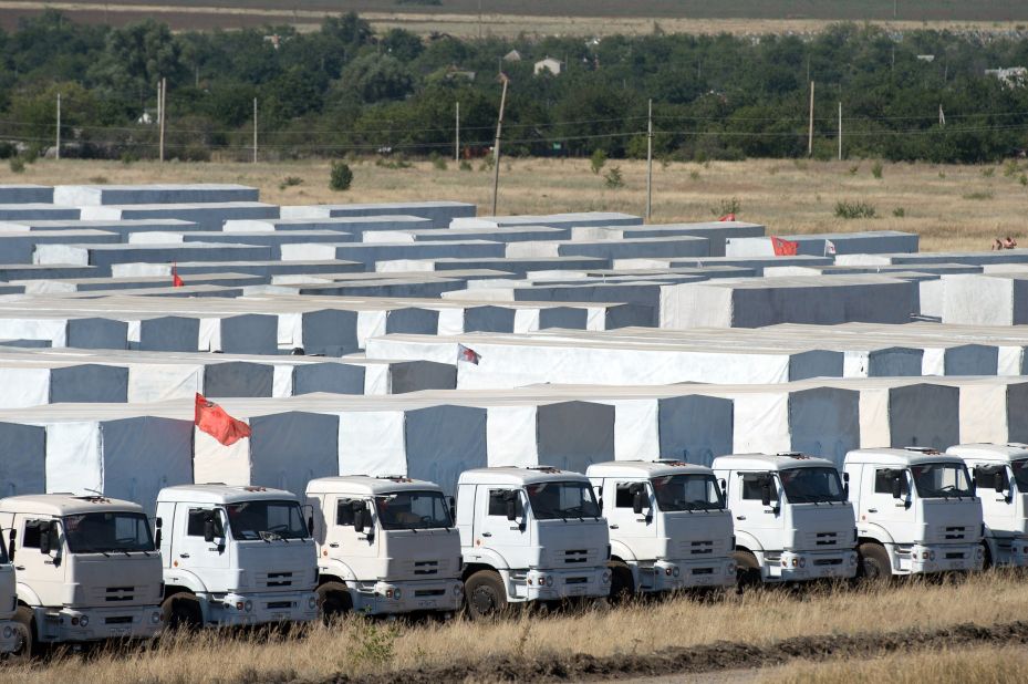 Trucks of a Russian humanitarian convoy are parked in a field outside the town of Kamensk-Shakhtinsky, in the Rostov region of Russia about 20 miles from the Ukraine border, on August 15. Ukrainian officials were preparing to inspect the convoy, which was bound for the conflict-torn east.