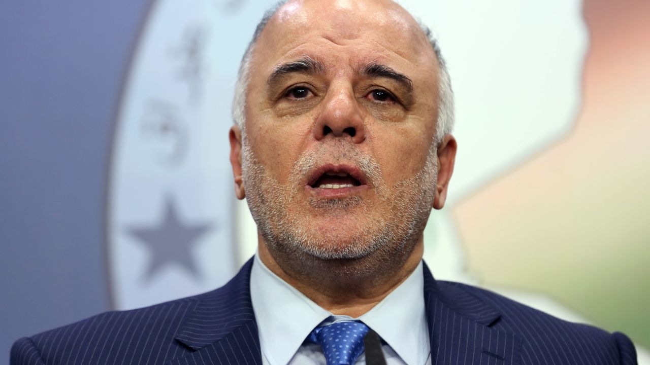 Haider al-Abadi speaks to the media after an Iraqi Parliament session in Baghdad. 