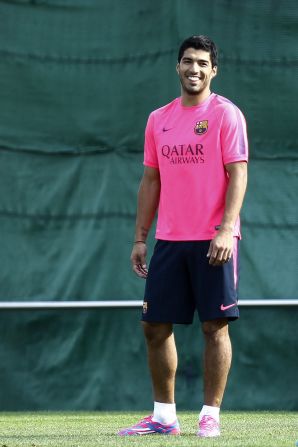 Suarez was in good spirits during the Friday training session at Barcelona's training ground and will be feeling flush too thanks to a reported $330,000 per week, five-year deal he has signed with the Spanish football giant.