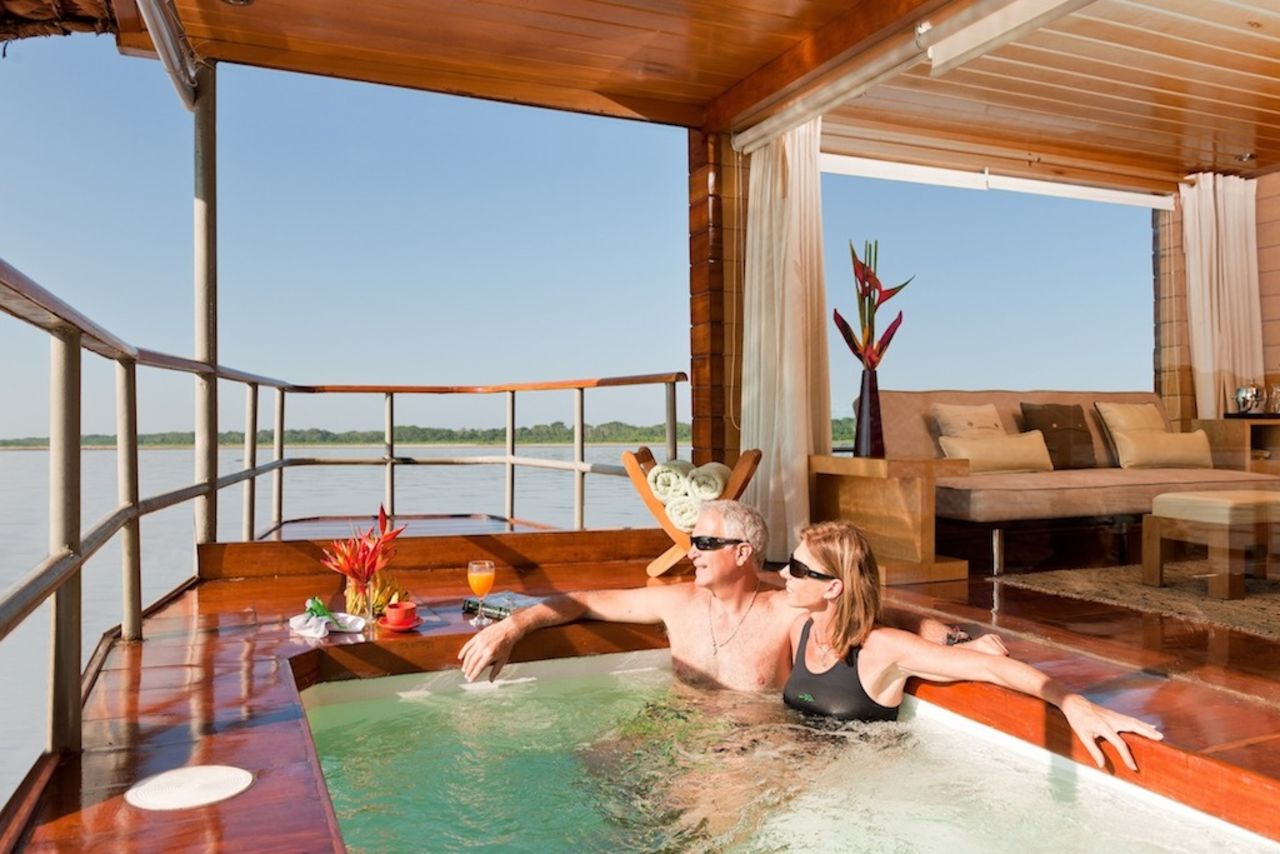 <strong>Luxury Amazon cruise (Peru)</strong>: From your hot tub you can watch the howler monkeys swing from the trees while you sip Champagne and chow down on the fish caught that morning. 