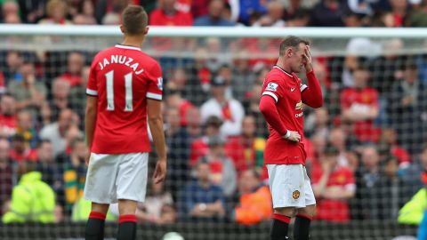 Wayne Rooney of Manchester United looks dejected during the Barclays Premier League match between Manchester United and Swansea City at Old Trafford on August 16, 2014.