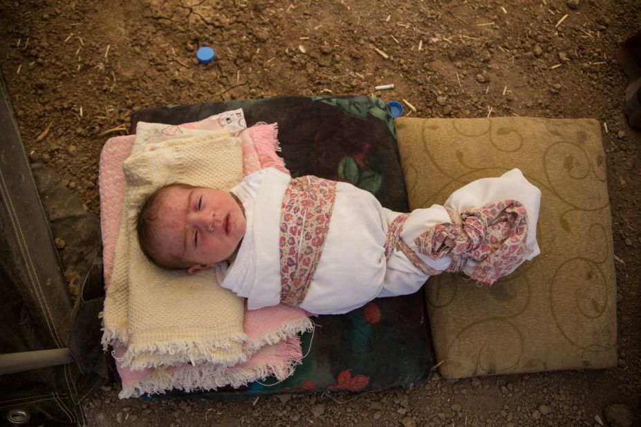 This 6-day-old girl was born on Sinjar Mountain. Her mother might name her "Hajar," meaning migrant or as the family interpreted it, "Exile."