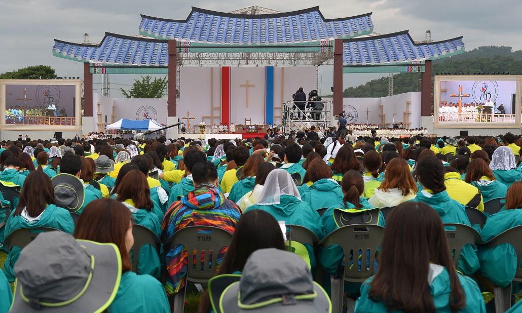 Young Catholics attend a Mass conducted by Pope Francis on August 17.