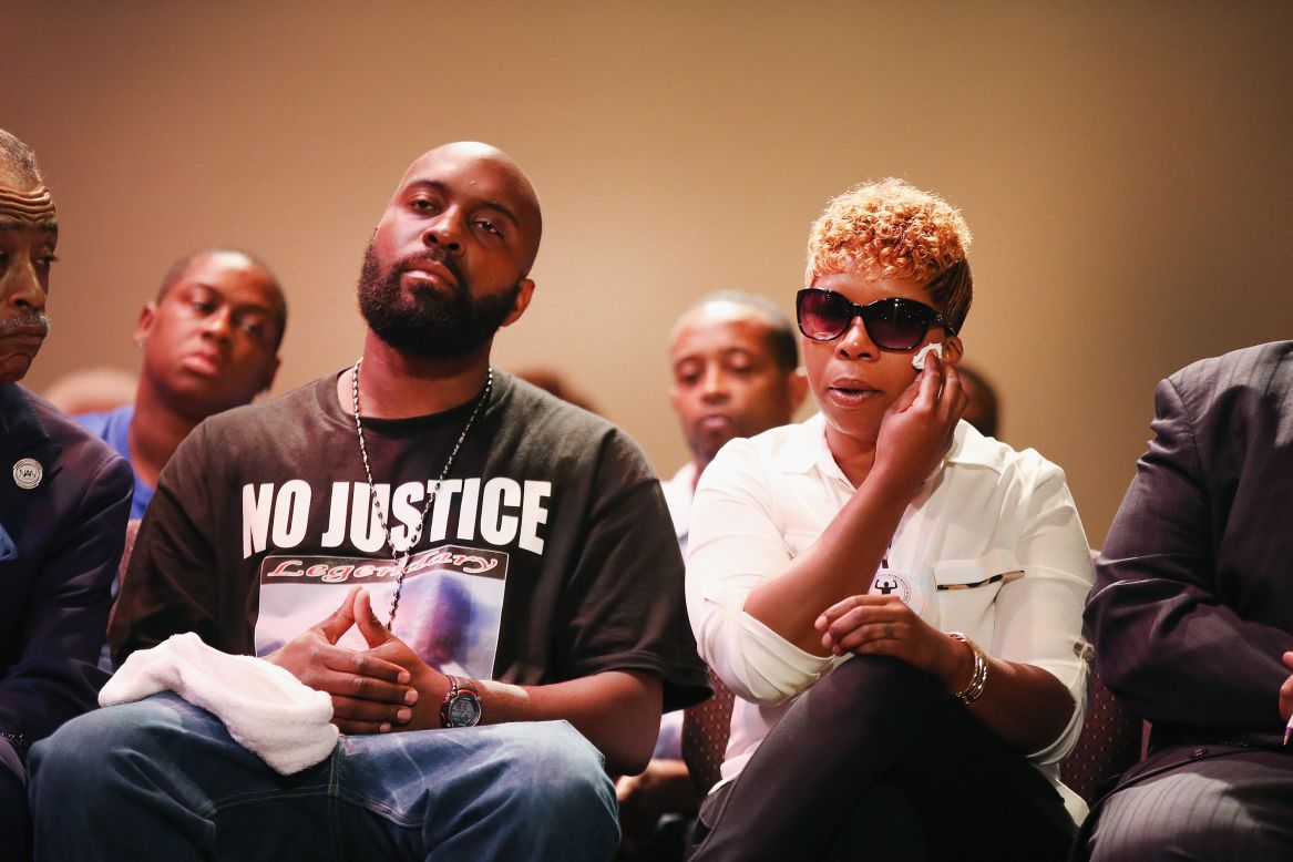 Michael Brown Sr. and Lesley McSpadden, the parents of Michael Brown, attend a rally at Greater Grace Church in Ferguson on August 17, 2014.