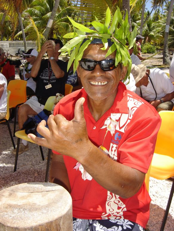 The residents of Puka Rua Atoll entertain cruise guests with drumming, a spear-throwing contest and a demonstration of barehanded octopus fishing.