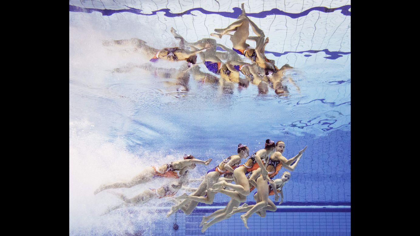 Synchronized swimmers from Belarus are seen underwater during their routine Wednesday, August 13, at the European Swimming Championships in Berlin.