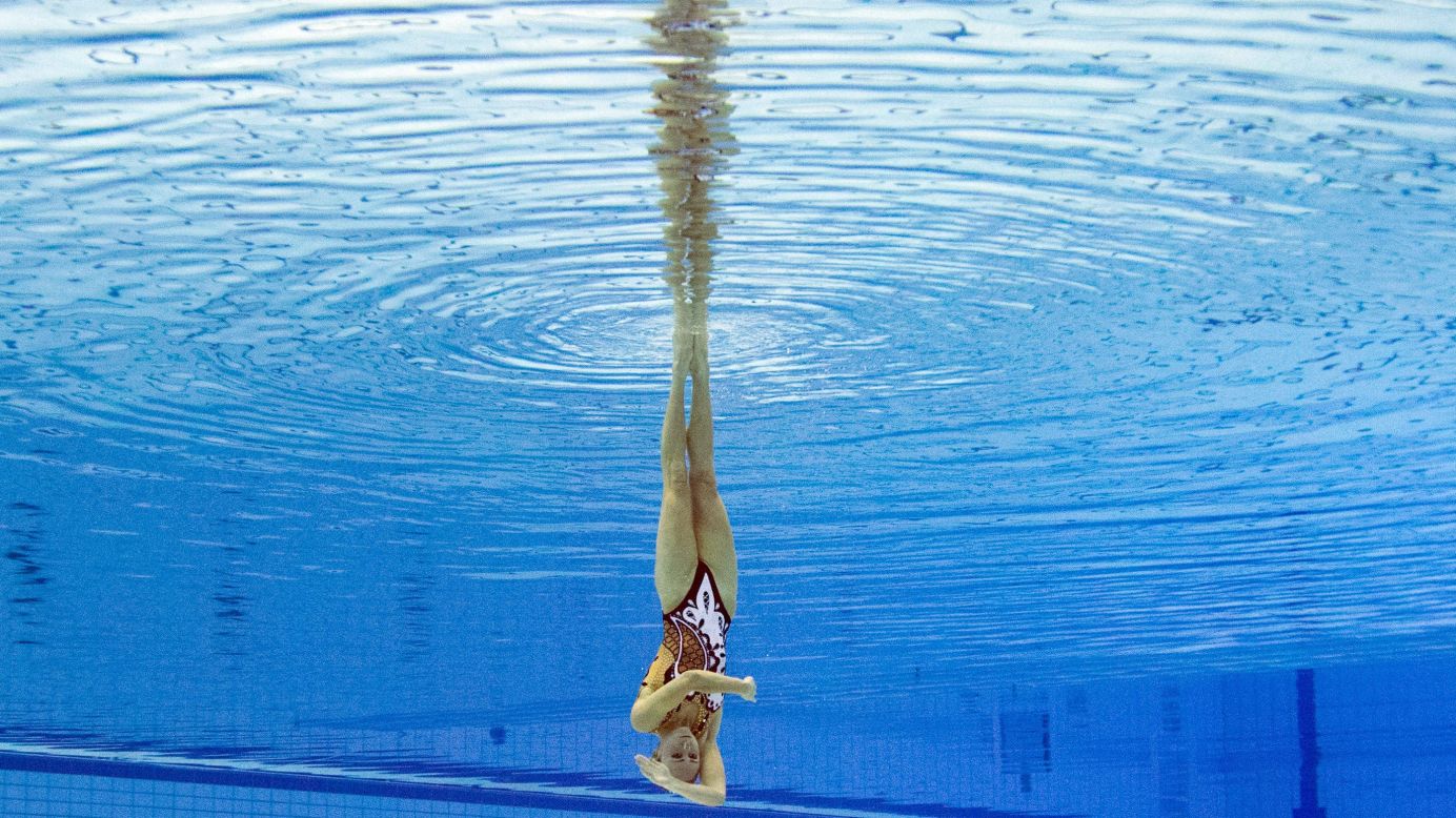 Ukraine's Anna Voloshyna is seen underwater as she competes in the solo synchronized swimming competition Sunday, August 17, at the European Swimming Championships in Berlin. She won the bronze medal in the event.
