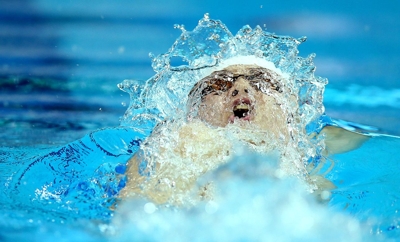 Chinese swimmer Li Guangyuan competes in the men's 100-meter backstroke Saturday, August 18, at the Youth Olympic Games in Nanjing, China. He finished third in the final.