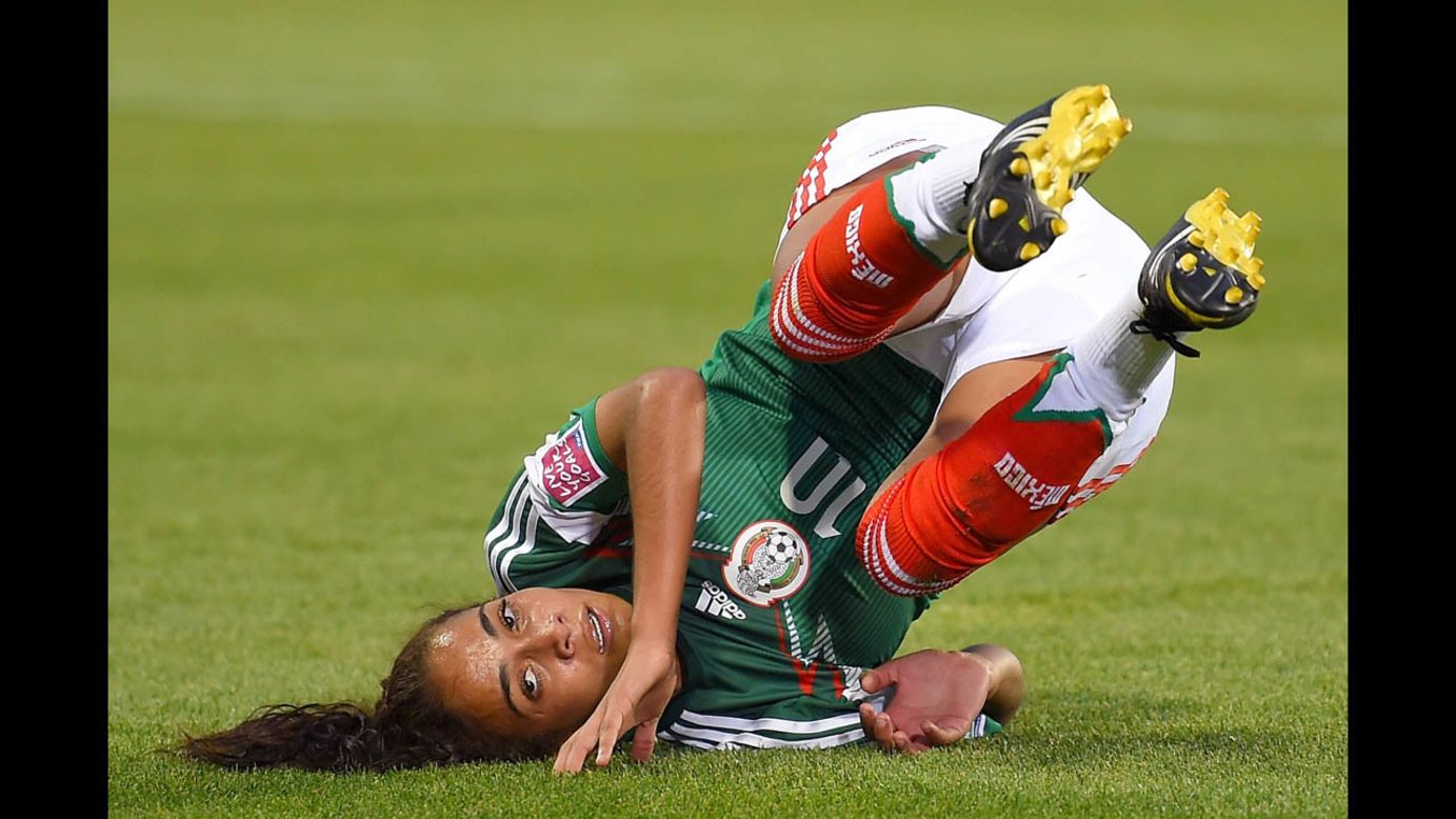 Carolina Jaramillo of Mexico falls to the field Wednesday, August 13, after missing a chance to score against South Korea during the U-20 Women's World Cup in Canada. South Korea won 2-1 to advance out of the group stage and eliminate Mexico.