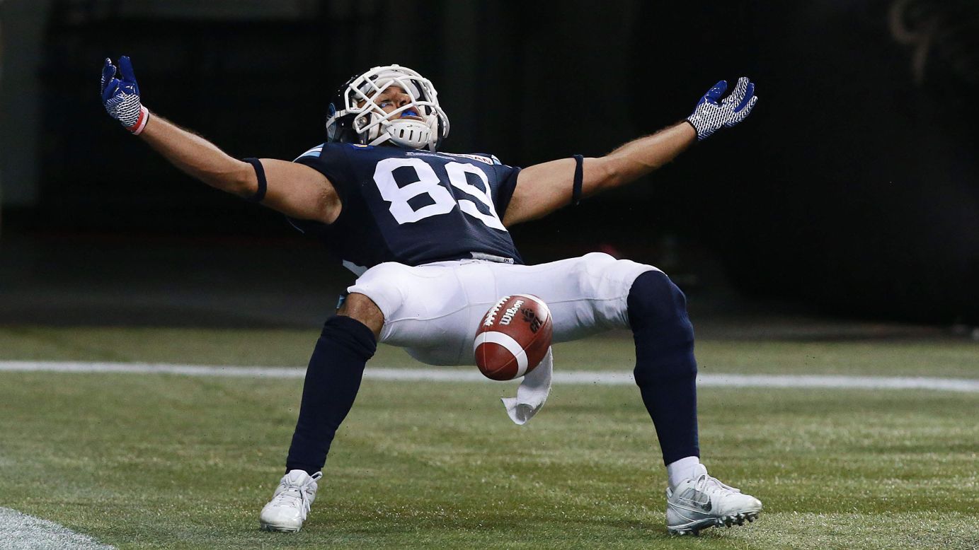 Spencer Watt, who plays for the Toronto Argonauts of the Canadian Football League, celebrates a fourth-quarter touchdown Tuesday, August 12, during a home game against the Winnipeg Blue Bombers. The Argonauts won 38-21.