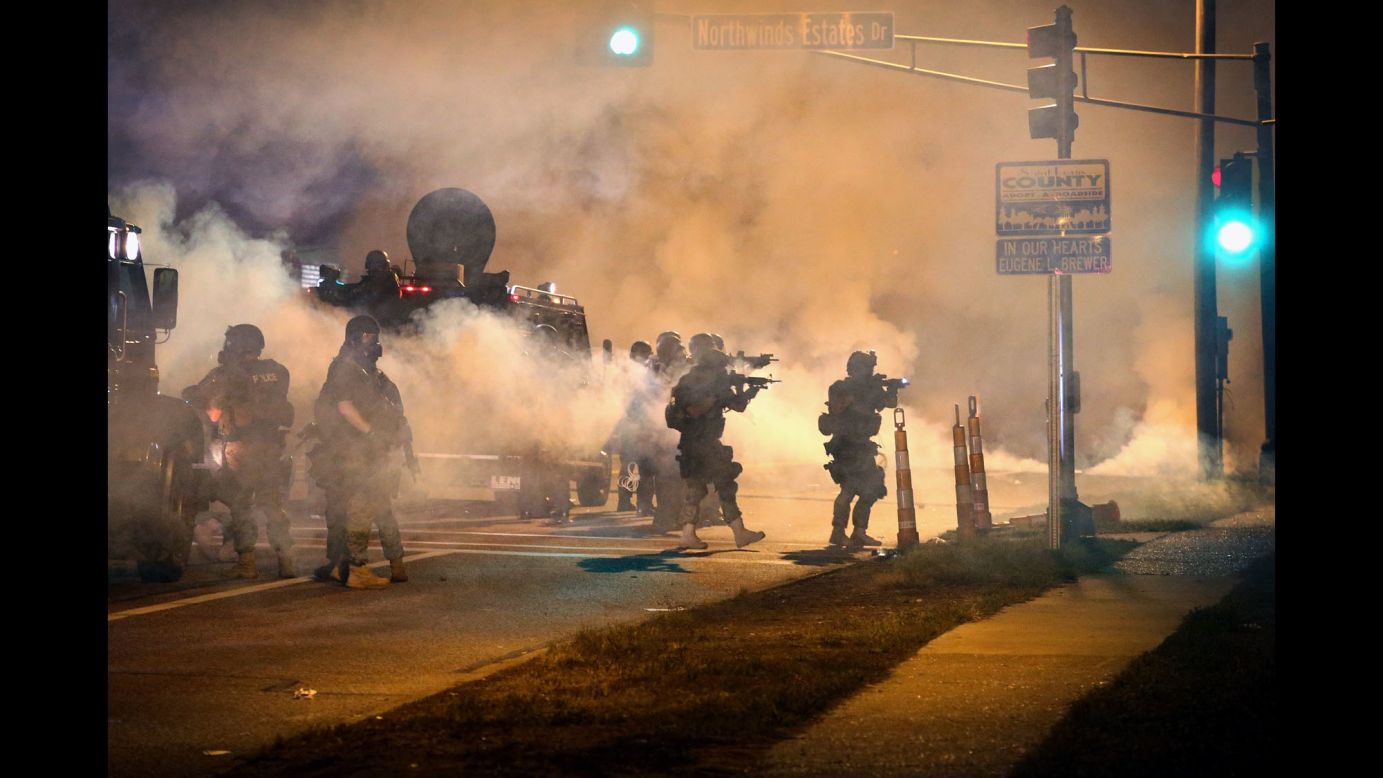 Police try to control protesters on Monday, August 18, 2014.