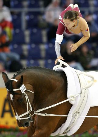 Vaulting is one of the World Equestrian Games' more flamboyant events, in which athletes perform gymnastics on the back of a horse. Here is Marion Graf of Switzerland in action.