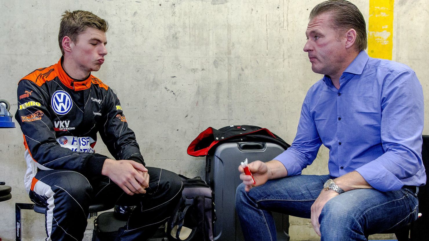 Red Bull's teenage Formula 1 driver Max Verstappen (L) with his father Jos