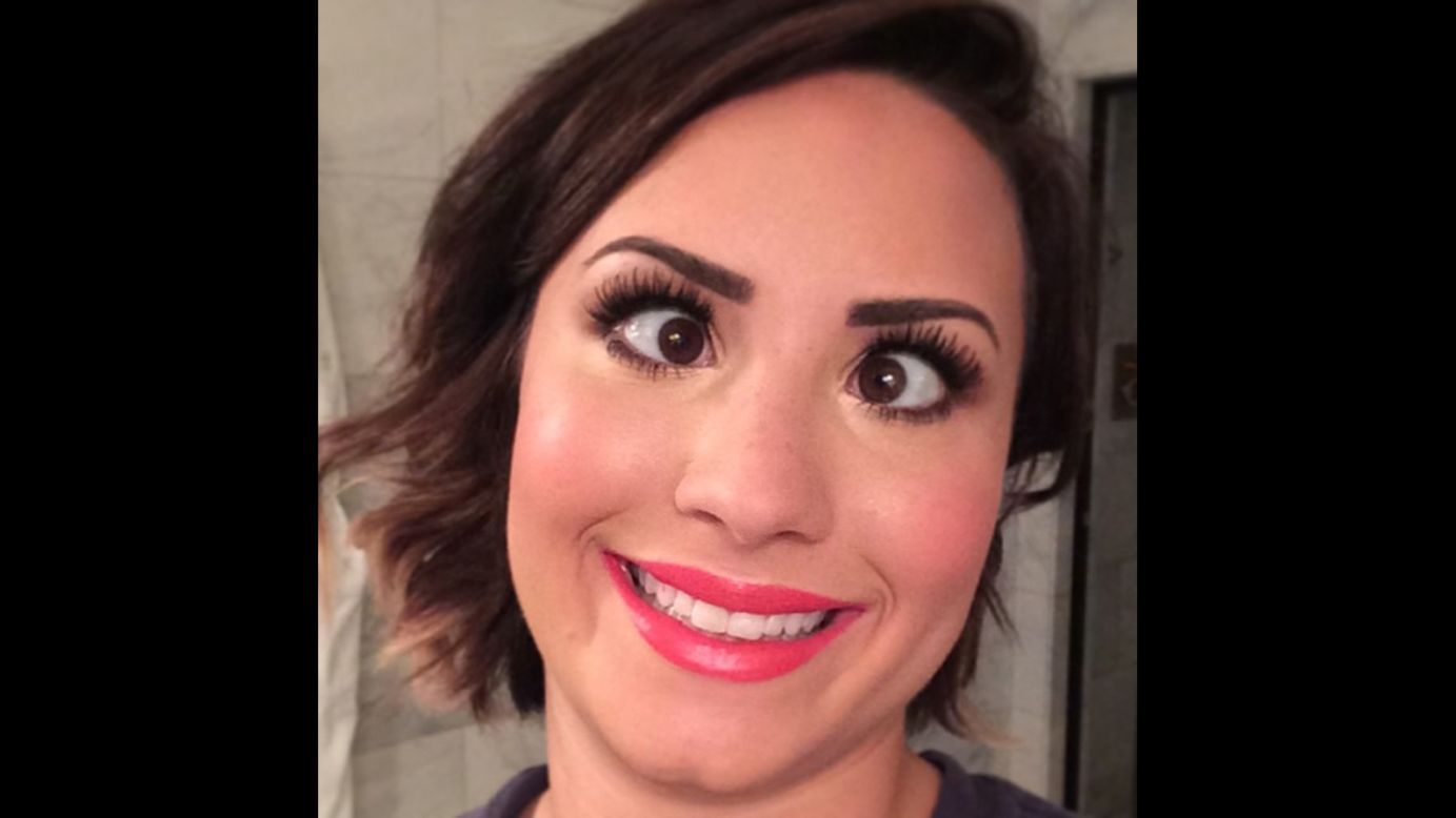 Actress and singer Demi Lovato <a href="http://instagram.com/p/rvOGfAuKk0/" target="_blank" target="_blank">posted this silly selfie</a> to Instagram on Friday, August 15, with the message: "6 am glamour-puss." She included the hashtag "#votedemilovato" as her "Really Don't Care" video is <a href="http://www.mtv.com/ontv/vma/2014/best-lyric-video/" target="_blank" target="_blank">up for an MTV Video Music Award.</a>