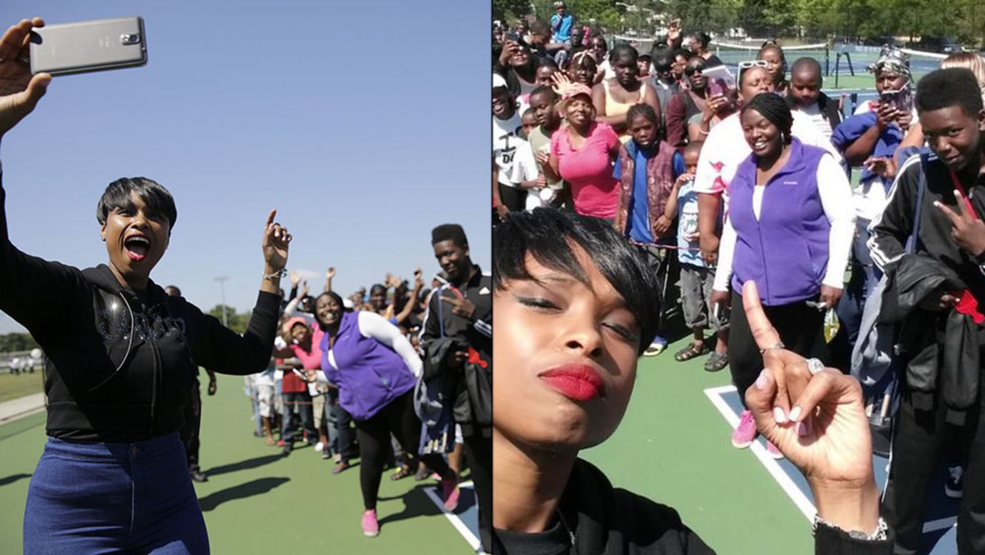 Actress and singer Jennifer Hudson <a href="http://instagram.com/p/rsFvqQOEmB/" target="_blank" target="_blank">takes a selfie</a> with people waiting in line for school supplies Thursday, August 14, as part of the Hatch Day celebration in Chicago. Hudson and her sister, Julia, organize the event every year to honor Julia's late son, Julian, on his birthday.