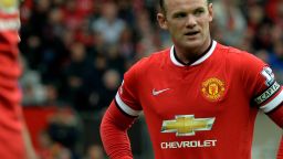 Star player Wayne Rooney sports the new Chevrolet branded strip but defeat in United's EPL opener against Swansea left a bitter taste.