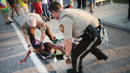 A demonstrator is arrested while protesting the killing of teenager Michael Brown on August 19 in Ferguson, Missouri. Brown was shot and killed by a Ferguson police officer on August 9.