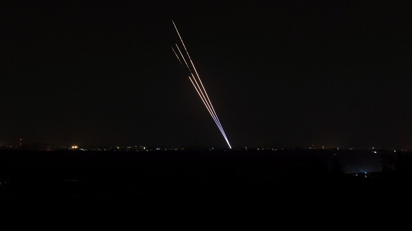 Light trails made by rockets fired from the Gaza Strip stand out against the night sky on Tuesday, August 19. Despite efforts to come to a peaceful agreement, Gaza militants launched rockets into Israel on Tuesday, and Israel responded with its own rockets.