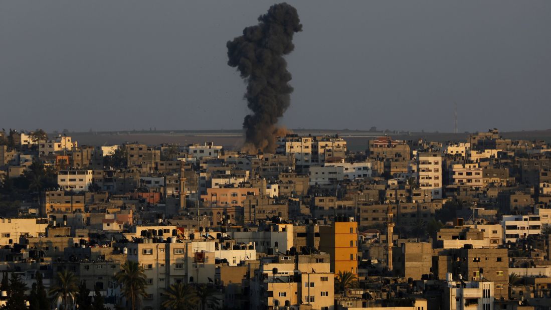 Smoke rises after an Israeli airstrike on Gaza City on August 19.