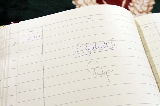 The Queen's signature is seen in the visitors book at Aras An Uachtarain, the Irish President's official residence in Dublin, Ireland, in May 2011.