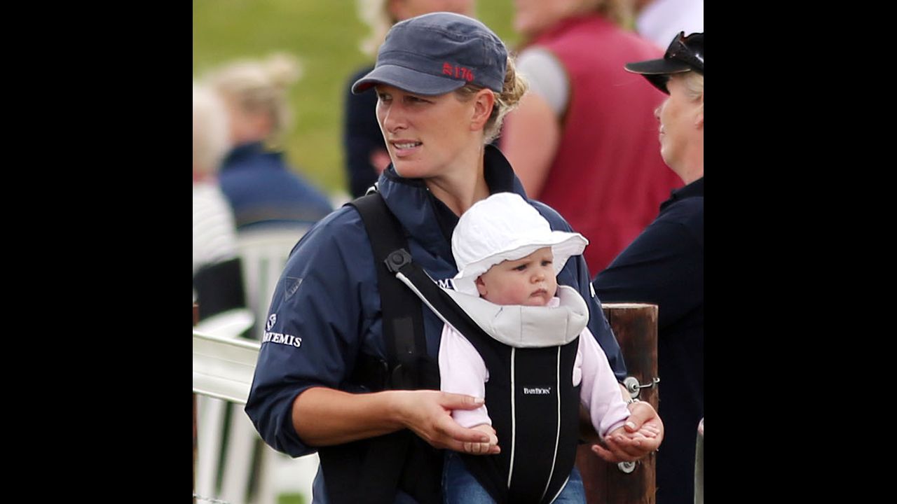 Zara Phillips holds daughter Mia Grace, born in January, during horse race trials in July. Phillips, a granddaughter of Queen Elizabeth II, is the daughter of Princess Anne and a cousin of Princes William and Harry. She is married to rugby player Mike Tindall. 