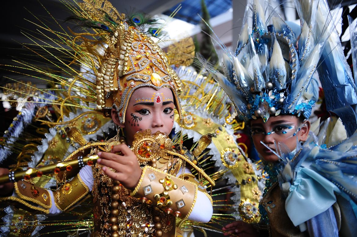 AUGUST 21 - JEMBER, INDONESIA: Elaborate costumes are on display during the children's version of the 13th Jember Fashion Carnival. The theme this year is "Triangle, Dynamic in Harmony" and consists of 10 processions. The street carnival is claimed to be one of the biggest in the world and comprises of more than 850 performers parading along a 3.6km road.