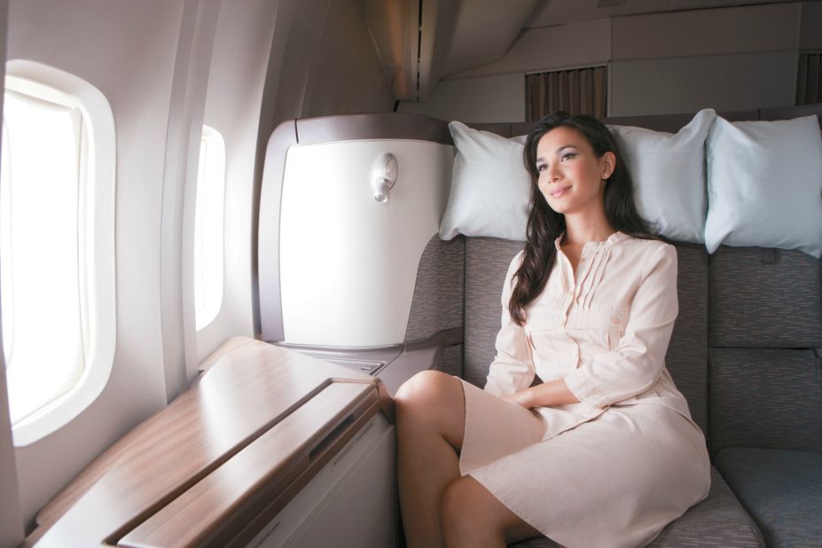 Cathay Pacific's first-class cabins have personal closets, a thick mattress and bedding, Bose headphones and an LCD touchscreen controller.
