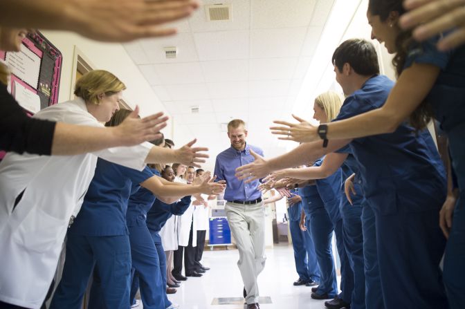 Ebola survivor Dr. Kent Brantly leaves Emory University Hospital after being released from treatment in Atlanta on Thursday, August 21. Brantly was one of two American missionaries brought to Emory for treatment of the deadly virus.